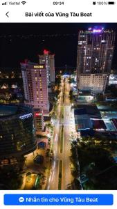 a view of a city street at night with buildings at Gia Han Guesthouse in Vung Tau +10 photos