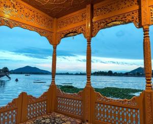a view of the water from the porch of a house at The Martin's Houseboat in Srinagar