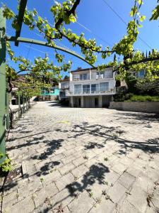 an empty courtyard in front of a building at Casa Maly in Portorož
