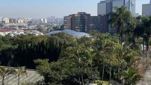 a view of a city with trees and buildings at Savannah Pousada in São Paulo