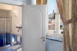 Koupelna v ubytování Albergo L'Antico Convitto