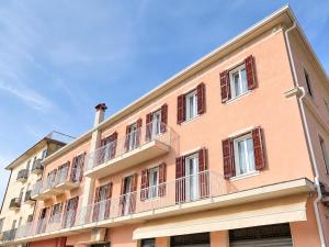 a building with balconies on the side of it at PETRONIA TRILO VISTA MARE - Agenzia Cocal in Caorle