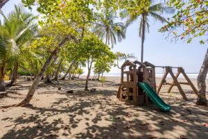 a playground on the beach with a slide at La Jolla in Bejuco