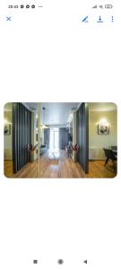 a rendering of a living room with wood floors at Gori Apartaments in Gori
