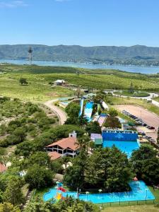 an aerial view of a water park with two pools at Peko's Multiparque Hotel in Villa Santa Cruz del Lago +49 photos