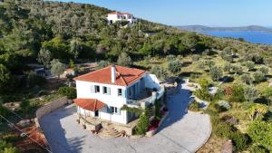 an aerial view of a house on a hill at Agrielia House in Alonnisos