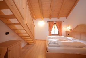 Postel nebo postele na pokoji v ubytování Hotel Fonte Dei Veli