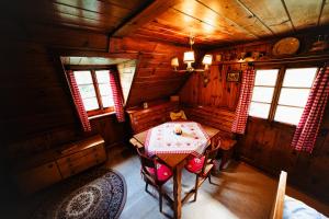 an overhead view of a room with a table in a cabin at Almhütte am Steirischen Seeberg in Turnau +22 photos