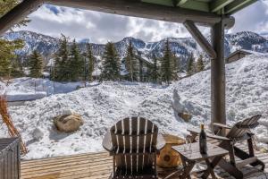 a deck with a view of a snow covered mountain at Snowcreek V 883 in Mammoth Lakes