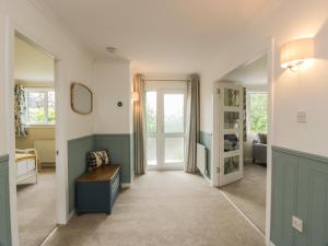 a hallway of a home with a living room at The Rowans in Newton Stewart