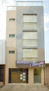 a hospital building with a sign on the front of it at Hostal Florida in Chiclayo