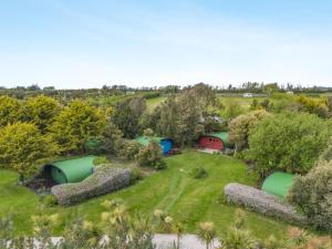 an overhead view of a garden with tents at 1 Bed in Bude oc-s34852 in Bude