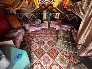 an aerial view of a room with a tiled floor at Aruna Guesthouse in Saty
