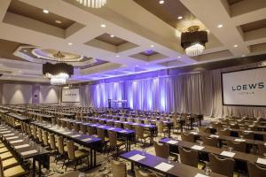 a large banquet hall with tables and chairs at Loews Nashville Hotel at Vanderbilt Plaza in Nashville