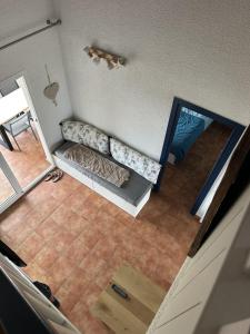 an overhead view of a living room with a couch at Corse Appartement Sognu di Mar Marine de Bravonne à Linguizzetta in Linguizzetta