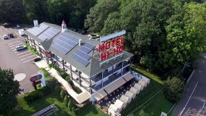 an overhead view of a building with solar panels on it at Hotel Hi-Ho - Contactless Check-In in Fairfield