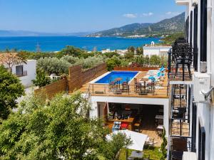 a view of a swimming pool from a building at Bodrum Blue Bay Hotel & Restaurant in Bodrum City