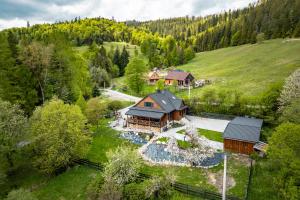 an aerial view of a lodge with a resort at Kamp Soblówka in Sablówka