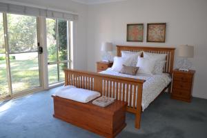 מיטה או מיטות בחדר ב-Clerevale Vacation Home