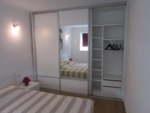 Posteľ alebo postele v izbe v ubytovaní Apartman Prima