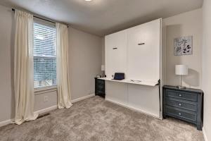 an empty room with a desk and a window at Downtown - Colorado Cool - Relaxing and Quiet in Colorado Springs