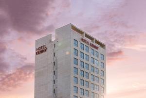 a tall white building with the words hotel lenox on it at Kenny Stay Busan Gijang in Busan