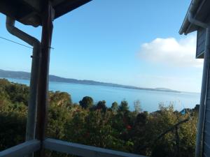 a view of the water from a house at Cabaña Chaicura in Ancud +2 photos