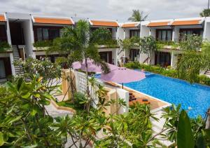 an aerial view of a resort with a swimming pool at Happy Resort Siem Reap in Phumi Ta Phul
