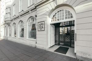 a store front with a sign on the door at Apótek Hotel Reykjavík by Keahotels in Reykjavík