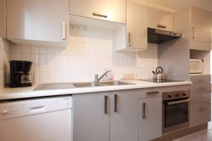 Kuchyň nebo kuchyňský kout v ubytování La Maison Tourangelle