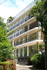 a large white building with a lot of windows at Sky View Grand in Kandy