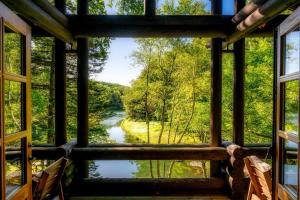 a window view of a river from a cabin at Hotel Nidom in Tomakomai