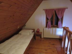 Ein Bett oder Betten in einem Zimmer der Unterkunft Guesthouse Stefanac