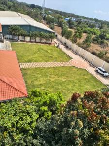 an aerial view of a large yard with a park at Greenway Retreat Resort in Puducherry Airpoert