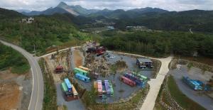 an aerial view of a parking lot next to a road at Yeongwol cubezone in Yeongwol +29 photos