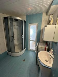 a bathroom with a shower and a sink at Villa Nora in Albena +43 photos