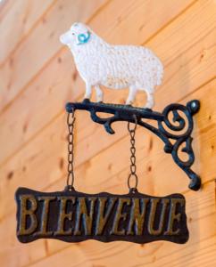 a sign that says berniversary with a sheep on it at Les Chambres de la Weiss in Kaysersberg
