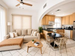 a living room with a couch and a table at Mykonos Recently remodeled 1BR Beach Escape great view! in San José del Cabo