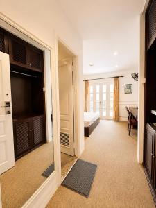 a room with a door open to a bedroom at X-Stay Cloud in Hai Phong