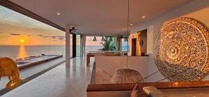 a living room with a view of the ocean at Villa Valentin in Salad Beach