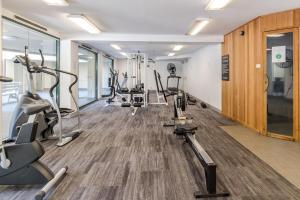 a gym with treadmills and cardio equipment in a building at Central 2-bed Apartment with Gym and Spa in Canberra +32 photos
