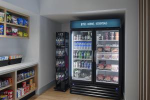 a refrigerator with its doors open in a store at Hyatt House Columbus OSU Short North in Columbus