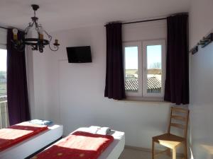 Postel nebo postele na pokoji v ubytování Hostal Moratinos