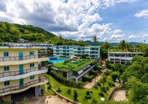 an aerial view of a resort with a swimming pool at Woodbridge Property at Karon Butterfly in Karon Beach