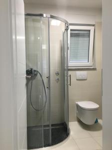 Koupelna v ubytování Apartmani Zaton