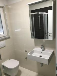 Koupelna v ubytování Apartmani Zaton