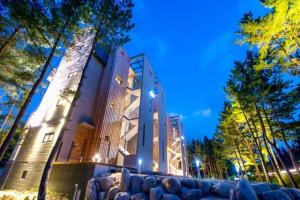 a building with a couch in front of it at Gosung La Henne Pull Villa J in Goseong