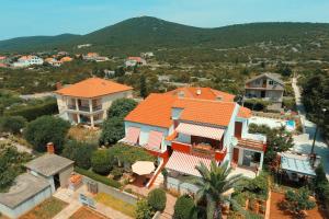 an aerial view of a house with an orange roof at Apartment Zrinka in Ist