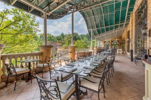 a row of tables and chairs on a patio at Omni Shoreham Hotel Washington DC in Washington, D.C.