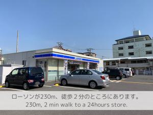 a car parked in front of a gas station at Alaula in Izumi-Sano +26 photos
